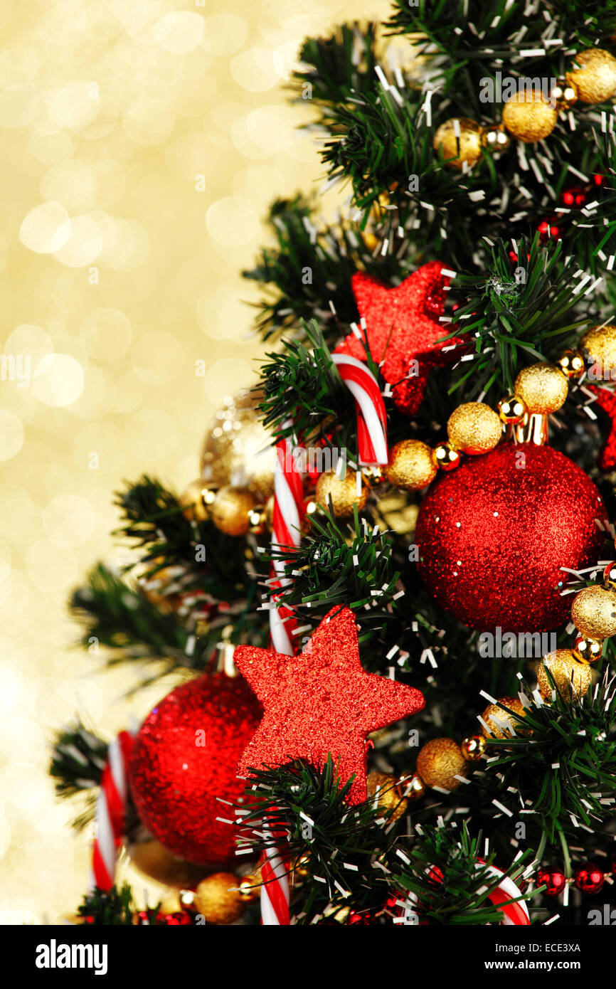 Beautiful decorated Christmas tree on glitter background Stock Photo ...