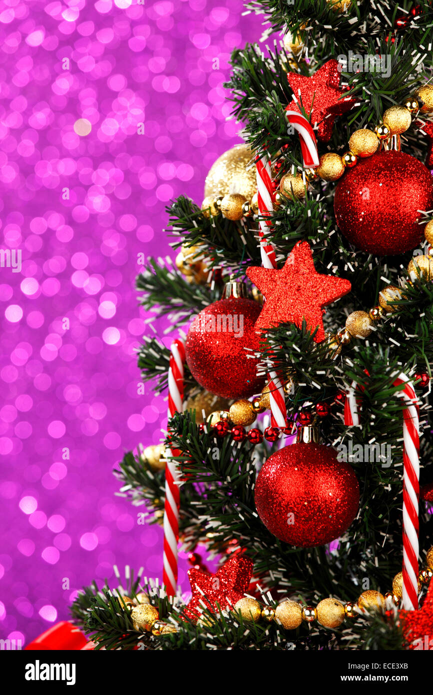 Beautiful Decorated Christmas Tree On Glitter Background Stock Photo