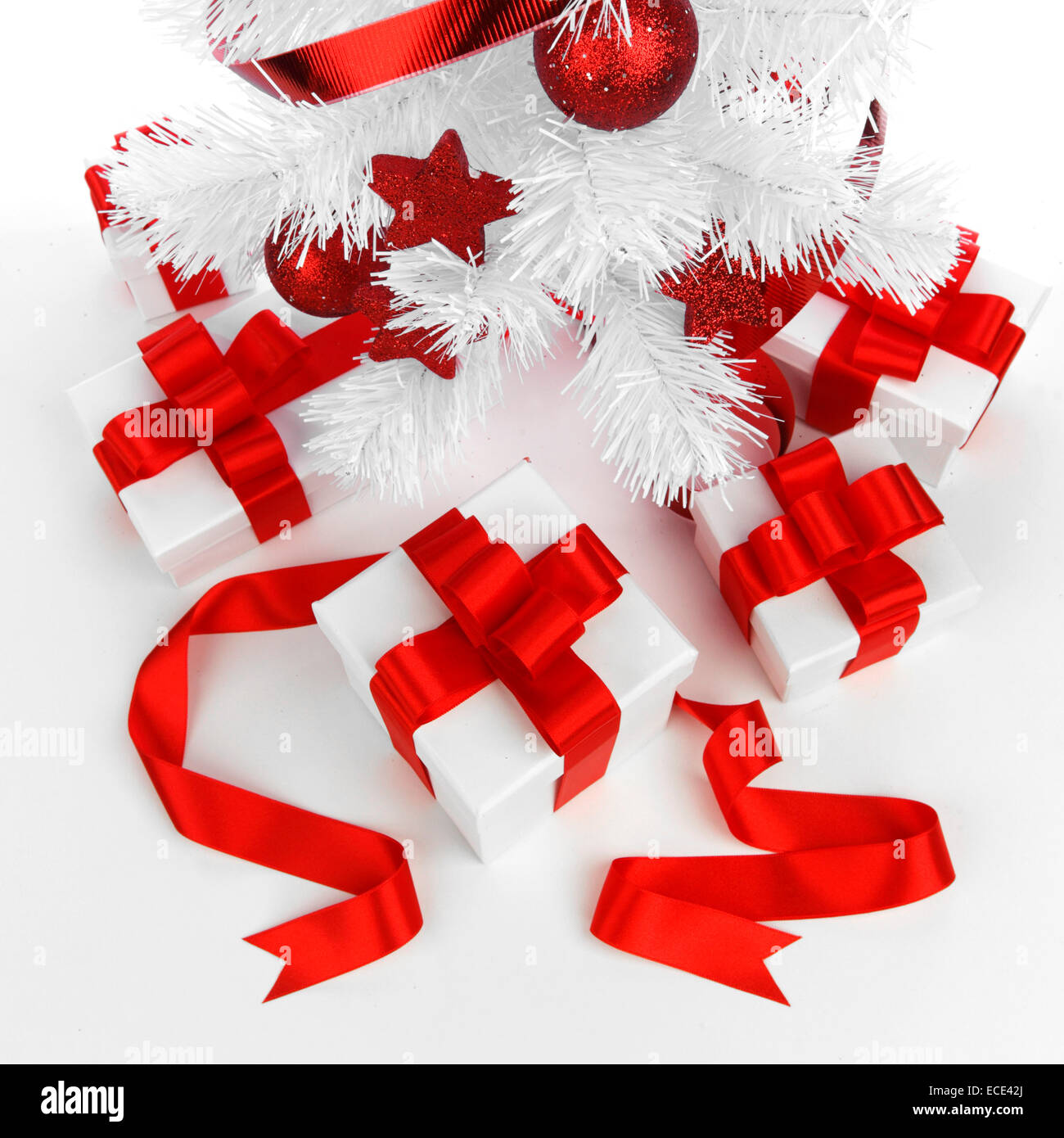 Christmas tree and gifts isolated on white background Stock Photo - Alamy