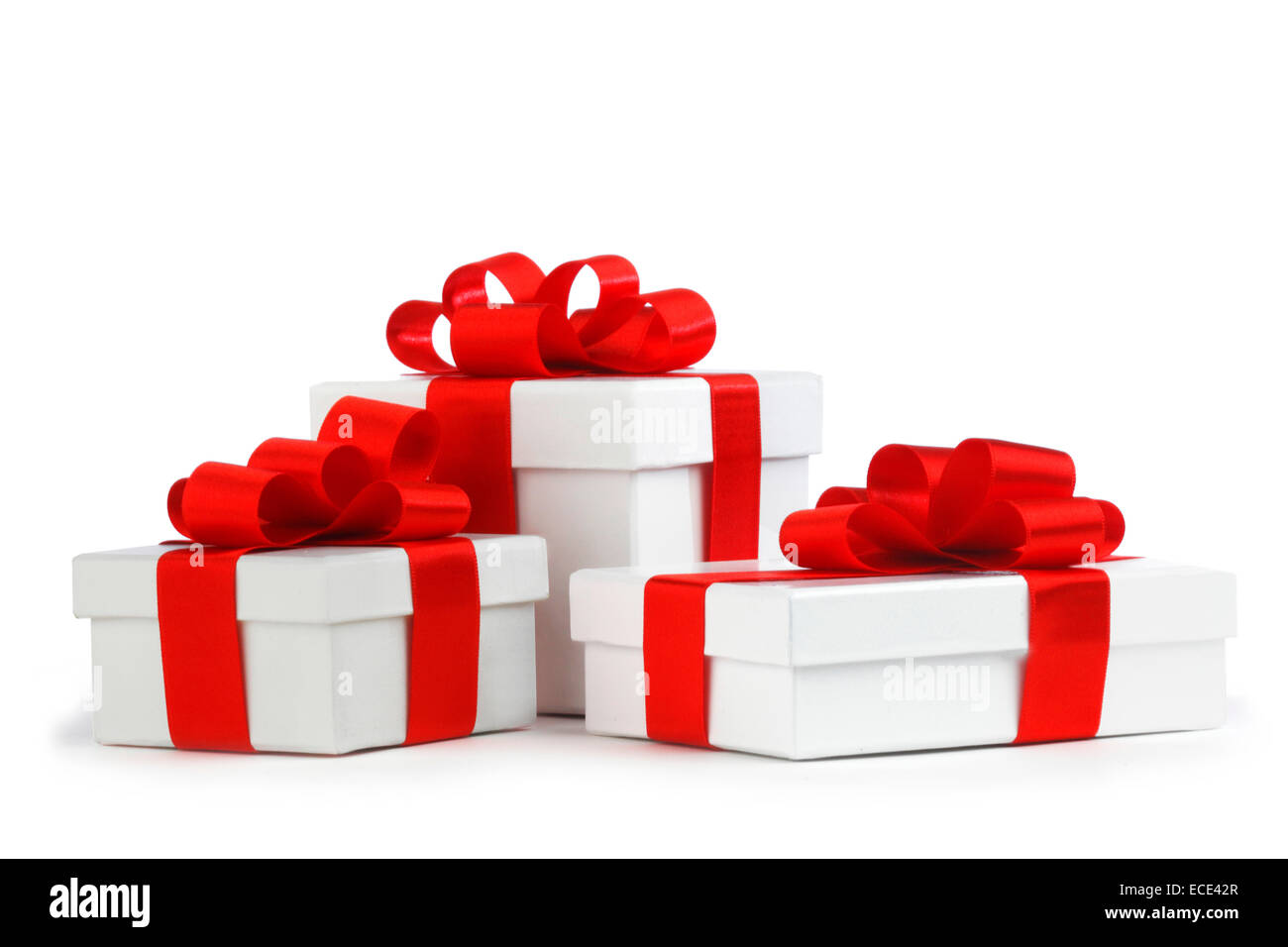 Gift boxes with red bow isolated on white background Stock Photo - Alamy