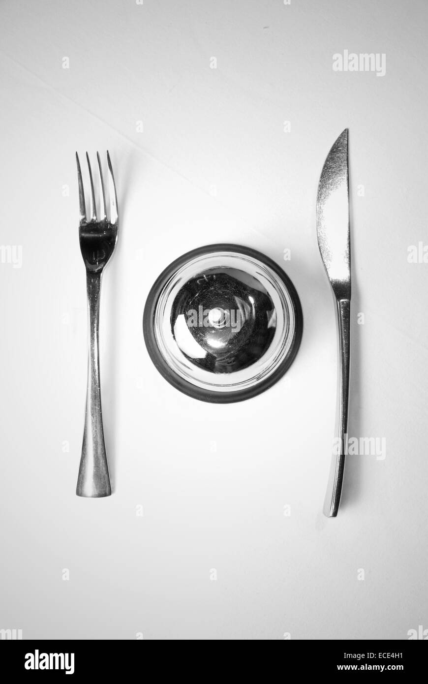 fork and knife on table with restaurant ring Stock Photo Alamy
