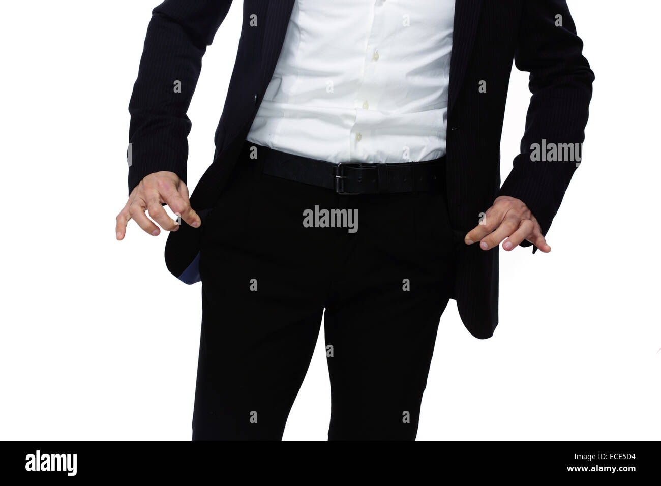 Businessman showing his empty pockets Stock Photo Alamy