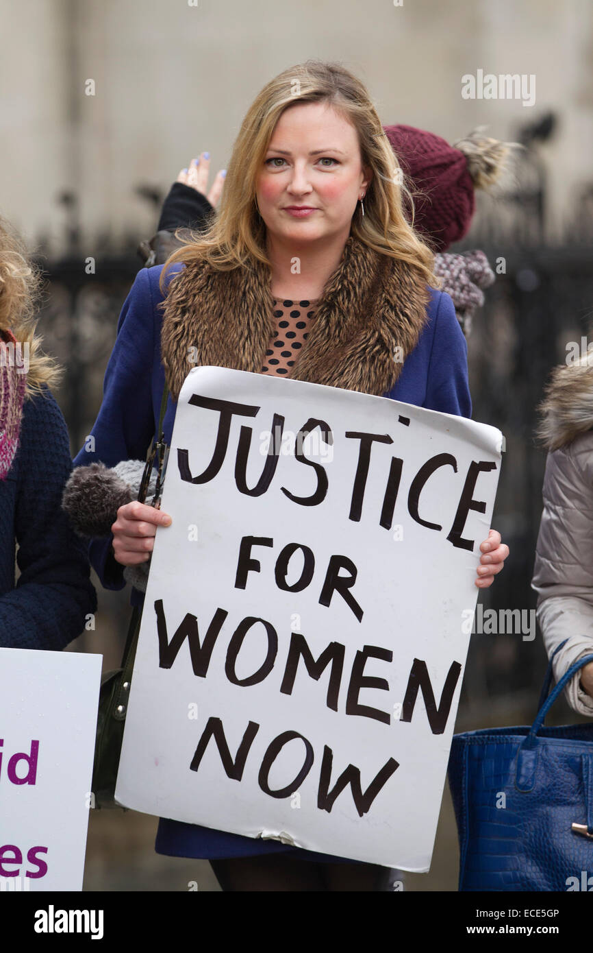 London, UK, 12th Dec, 2014. Woman's Rights Demonstration, Royal Courts of Justice, High Court, London, UK 12.12.2014 Picture shows representatives from Woman's Rights Charities demonstrating outside the Royal Courts of Justice today as a challenge is made over cuts to legal aid impacting on victims of domestic violence. Pictured Ruth Tweedale from 'Justice for Woman Now'. Credit:  Jeff Gilbert/Alamy Live News Stock Photo