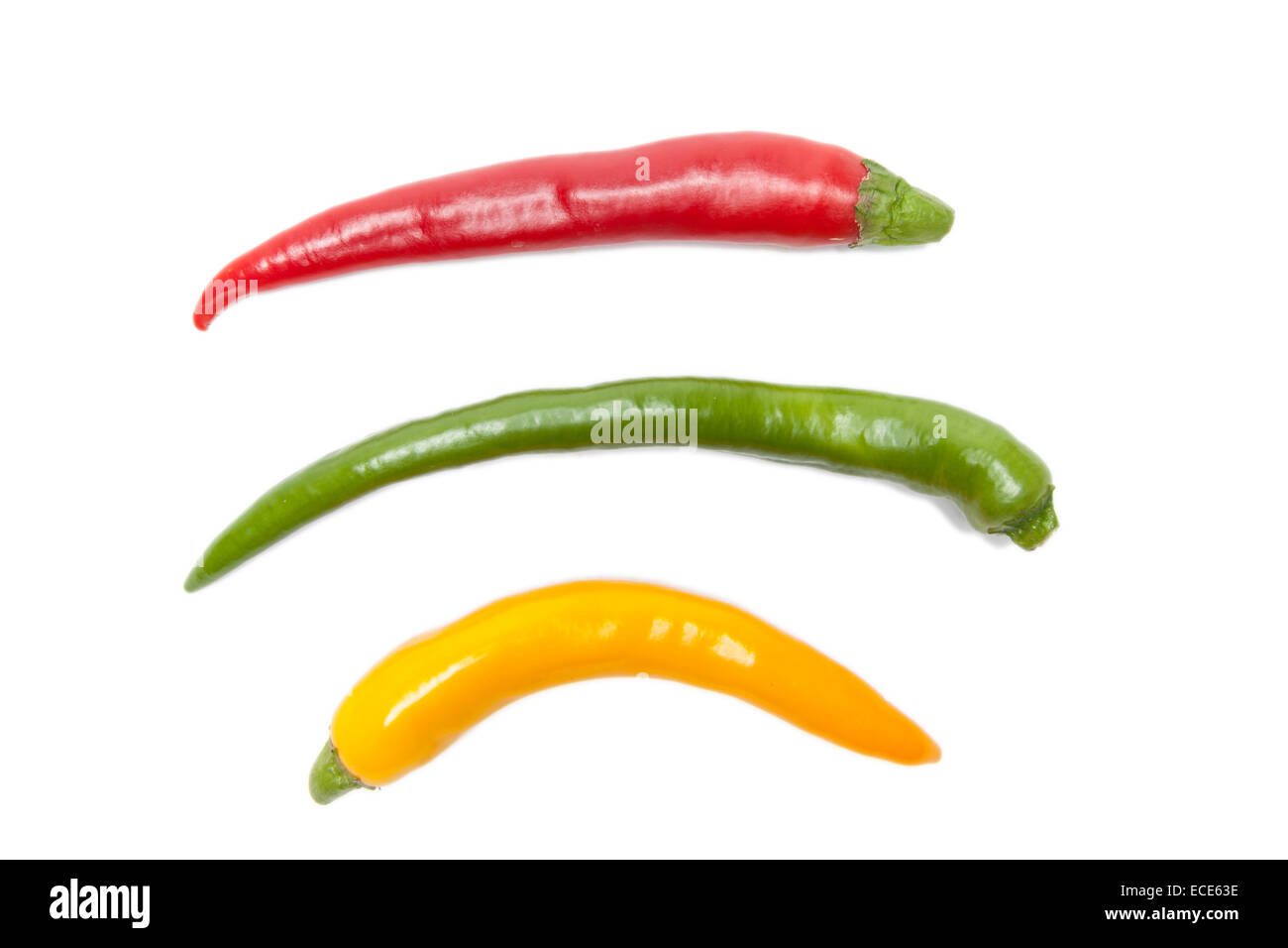 red chillies in different colors isolated Stock Photo