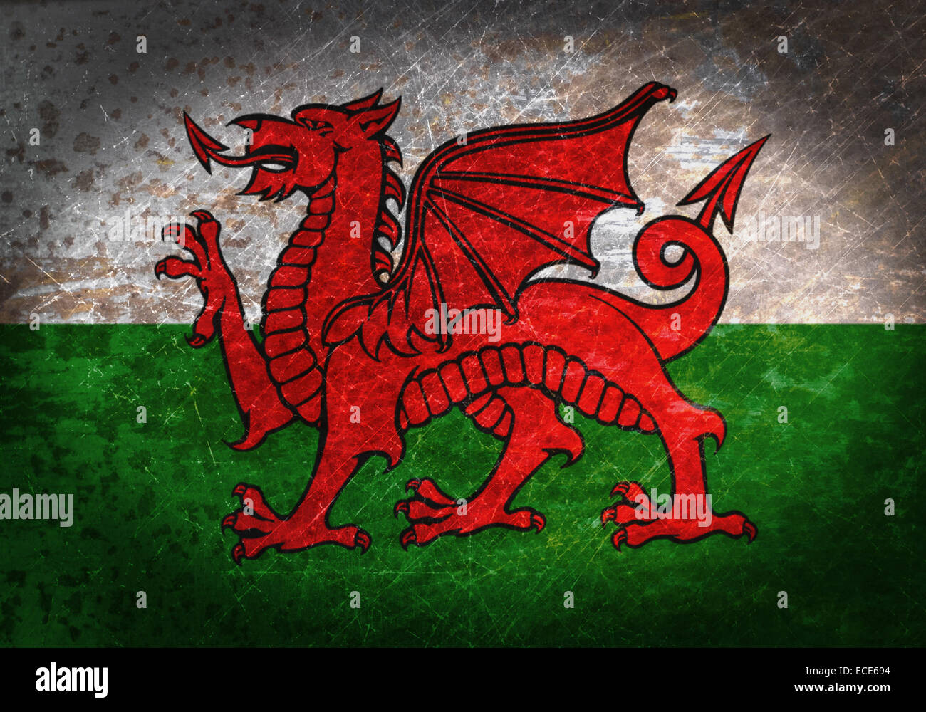 Old rusty metal sign with a flag - Wales Stock Photo