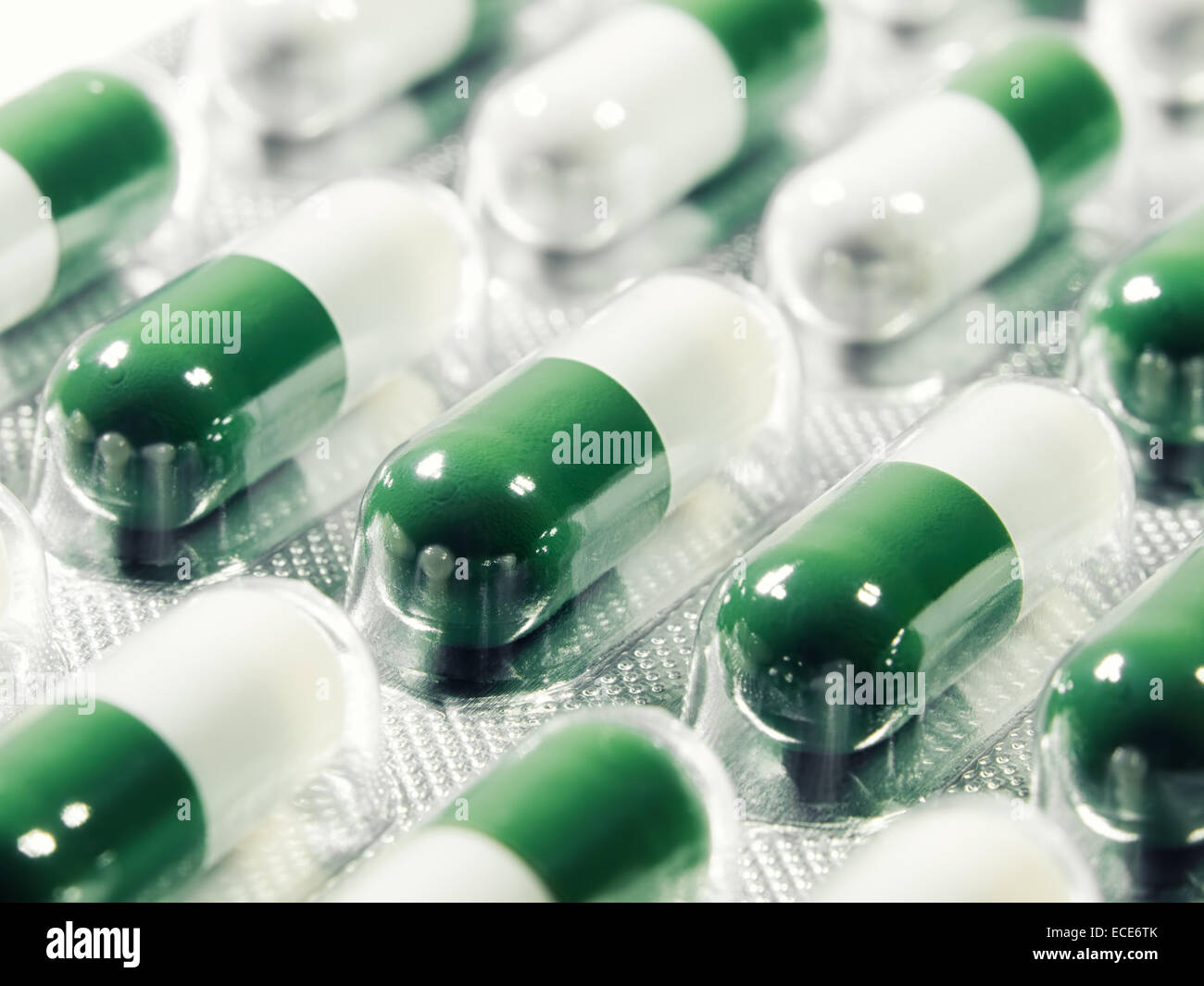 Macro view of capsules in a blister pack Stock Photo - Alamy