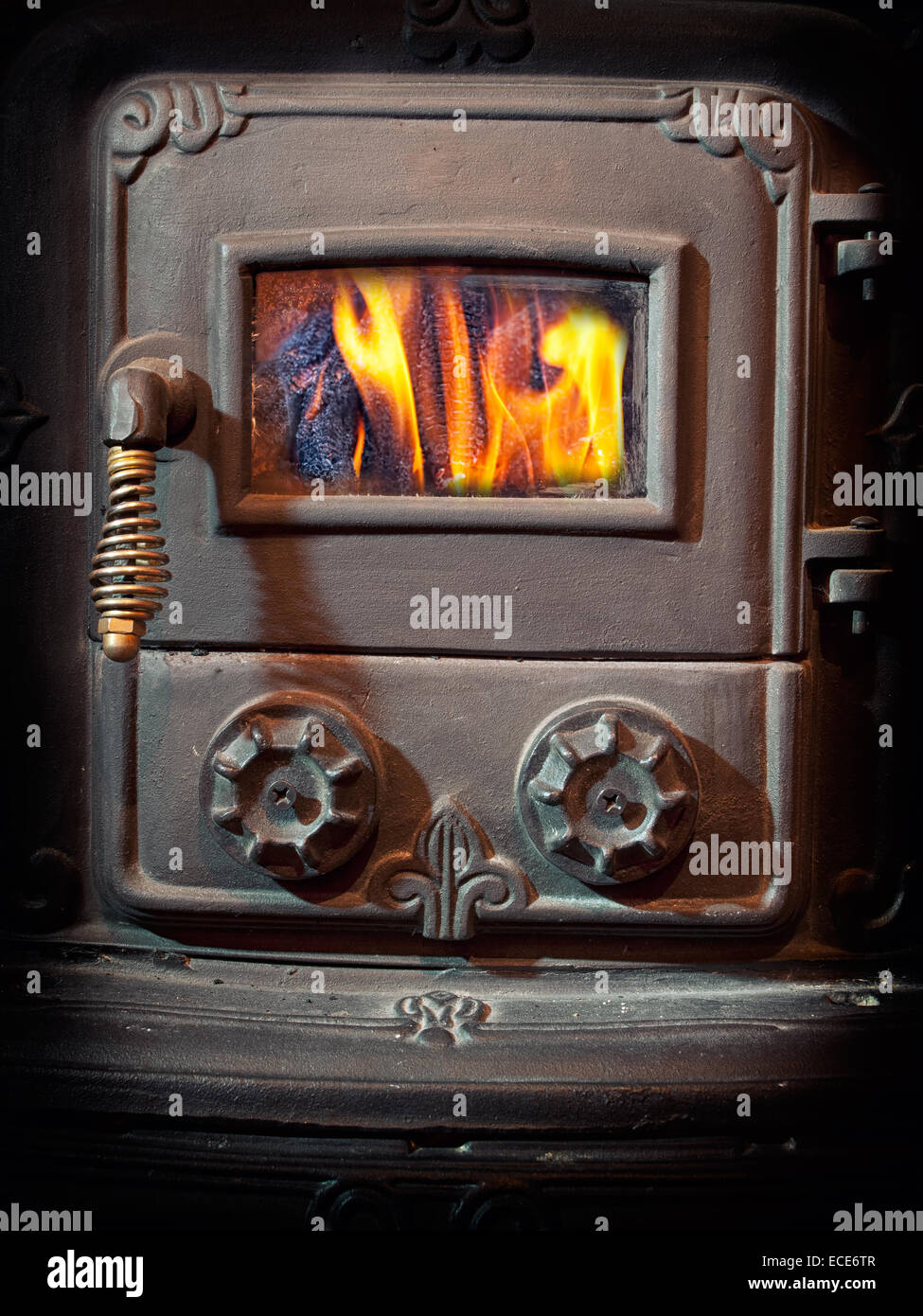 https://c8.alamy.com/comp/ECE6TR/firebox-door-of-a-retro-wood-burning-stove-ECE6TR.jpg