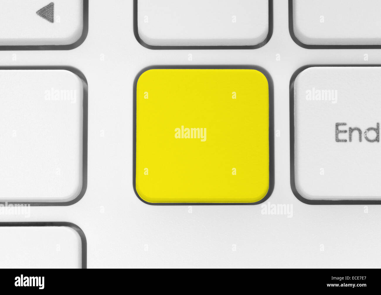Blank yellow button on the keyboard Stock Photo