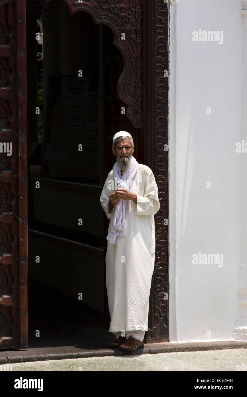 Mauritius, Port Louis, Rue Royale, Jummah Mosque Muslim man in doorway Stock Photo
