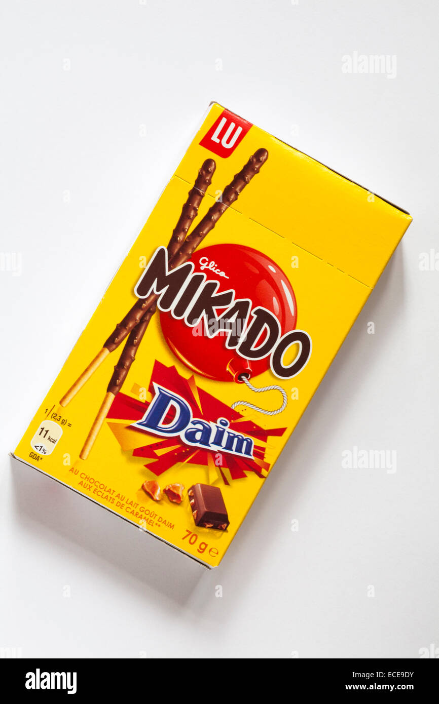 Box of unopened Lu Glico Mikado Daim biscuits isolated on white background - Mikado sticks Stock Photo