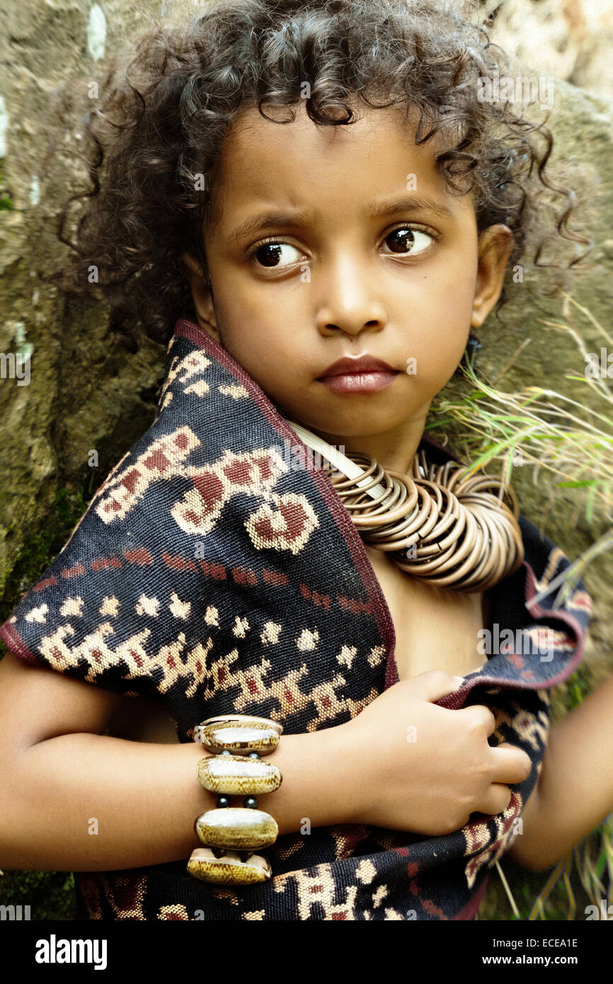 Indonesia, Portrait of girl (4-5) wearing jewellery Stock Photo