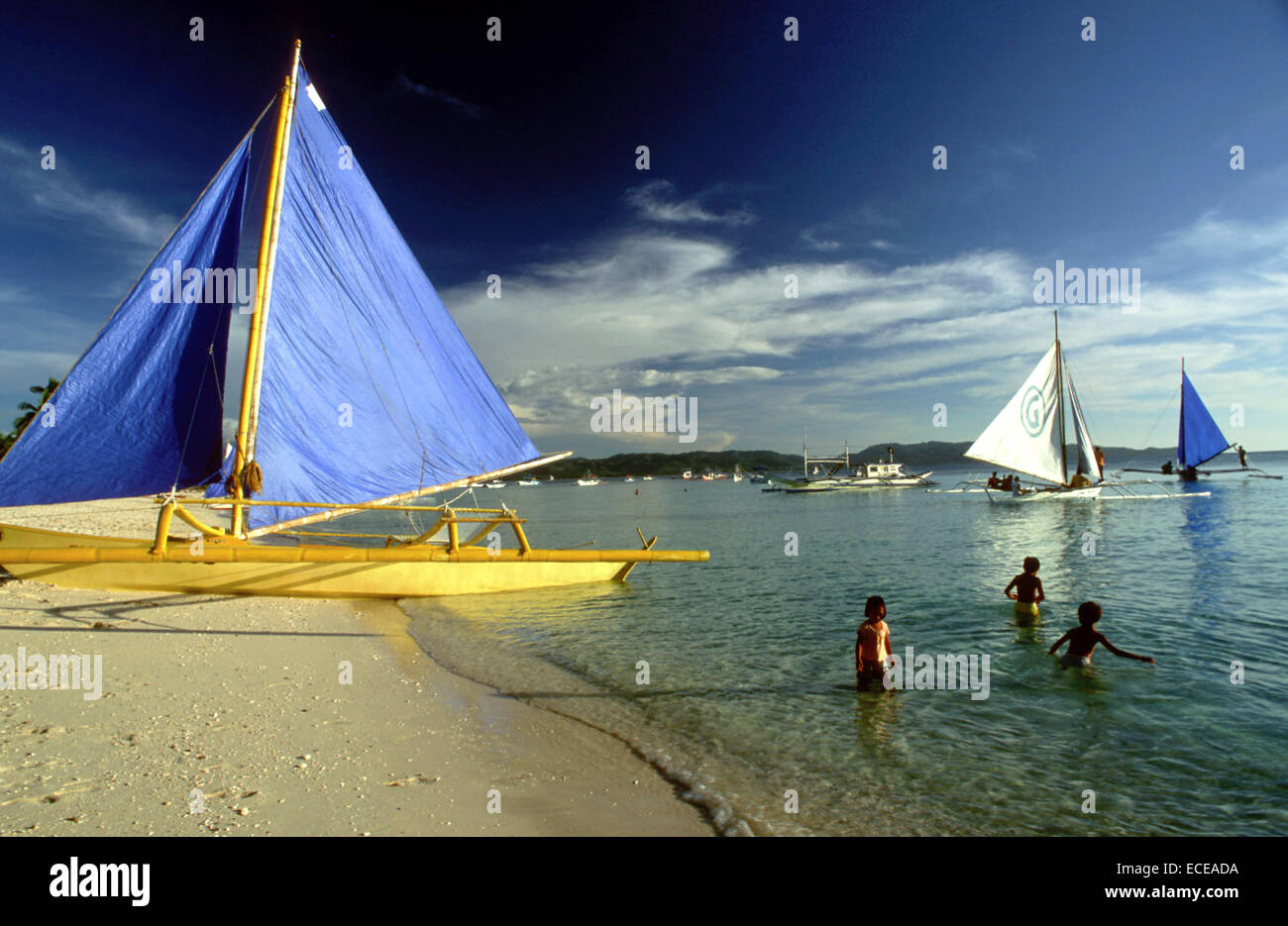 Boats to practice sailing. White beach. Boracay. Philippines. Boracay is a small island in the Philippines located approximately Stock Photo