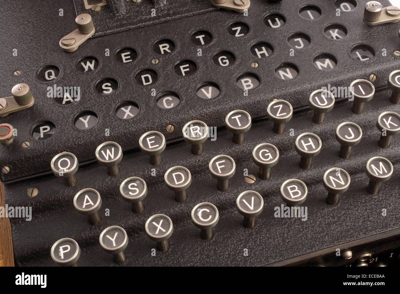 Keyboard of a Nazi German Enigma cipher machine used during World War II to develop nearly unbreakable codes for sending messages. The Enigma's settings offered 150,000,000,000,000,000,000 possible solutions. Allied efforts based in Bletchley Park, England were eventually able to crack the code using the world's first electromagnetic computers. Stock Photo