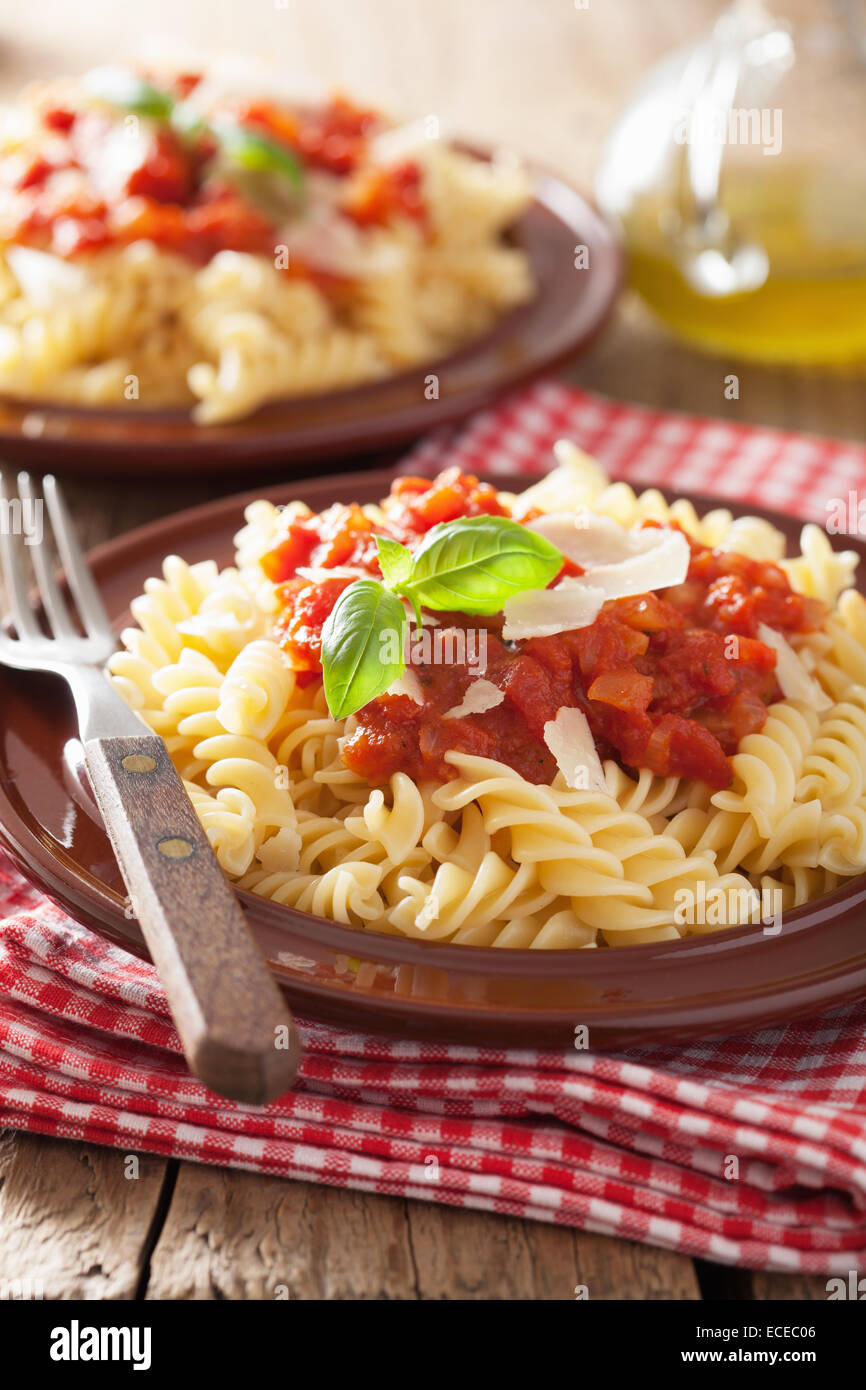 italian classic pasta fusilli with tomato sauce and basil Stock Photo