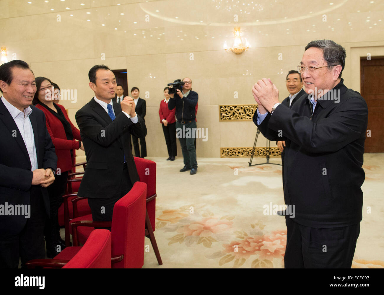 (141212) -- BEIJING, Dec. 12, 2014 (Xinhua) -- Yu Zhengsheng (R ...