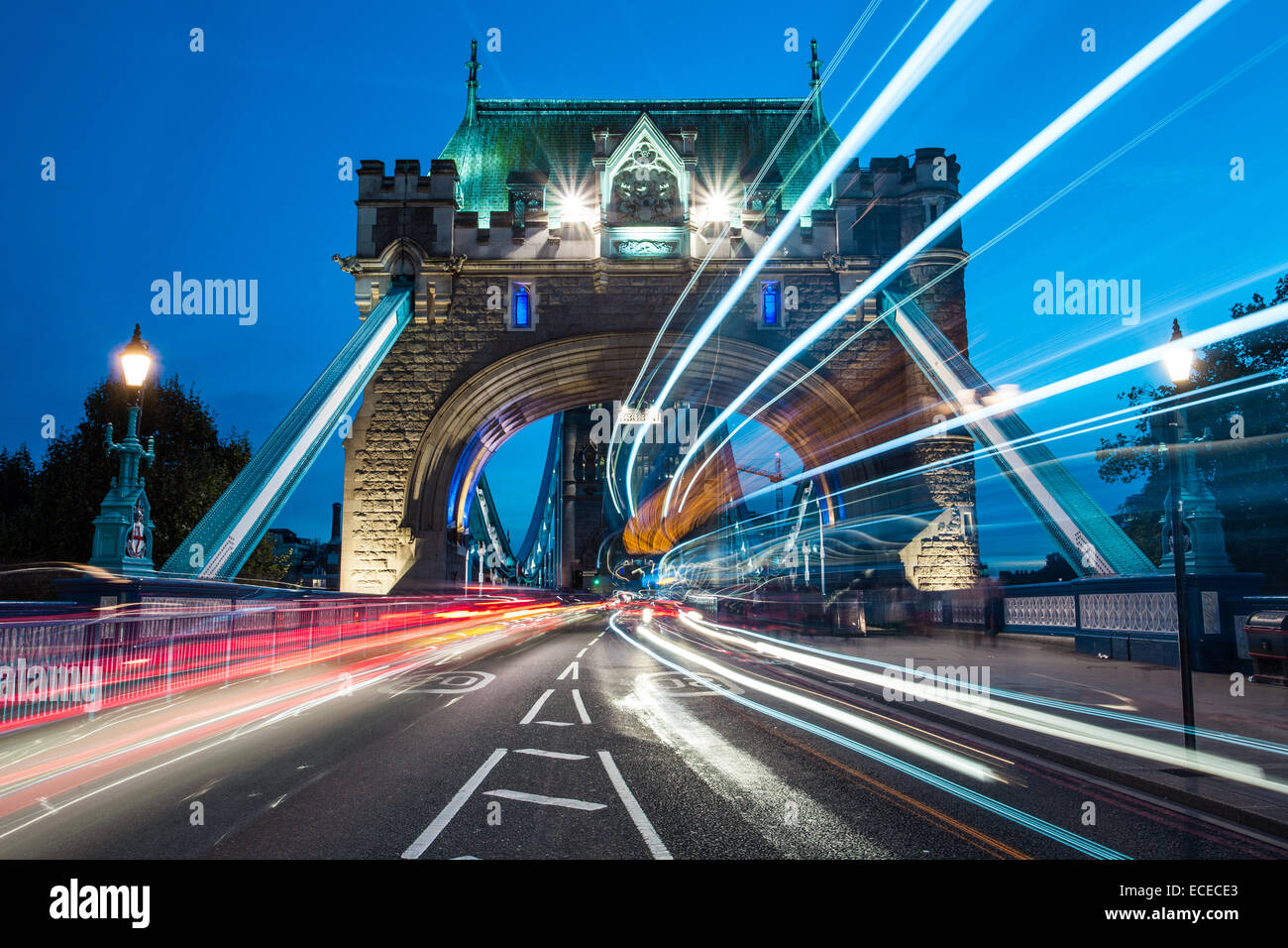 Light streams from traffic crossing tower bridge hires stock