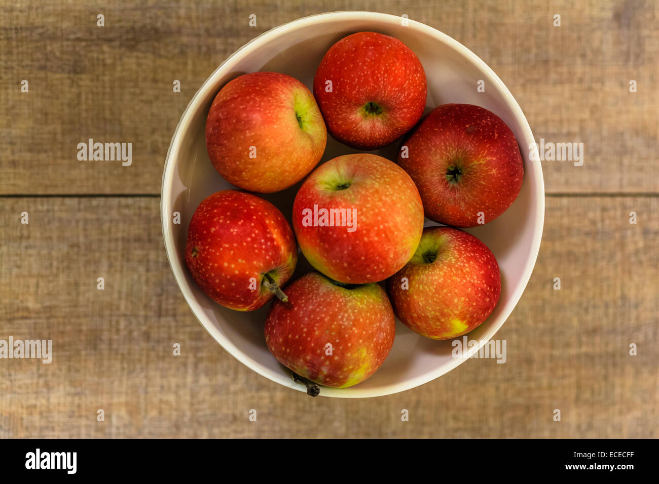 Apples In White Fruit Bowl High Resolution Stock Photography and Images