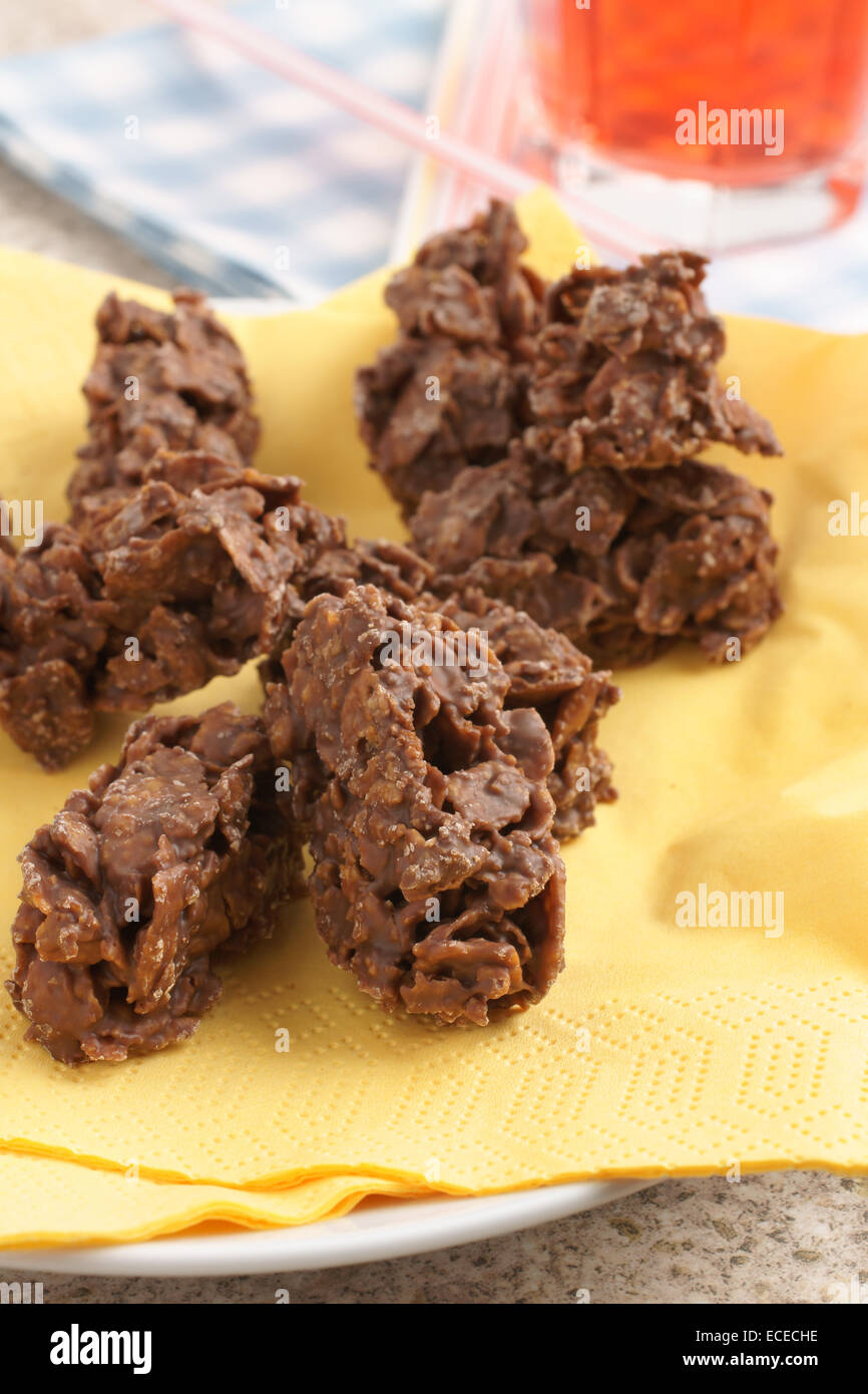Chocolate corn flake cakes a simple party cake recipe for children to make Stock Photo