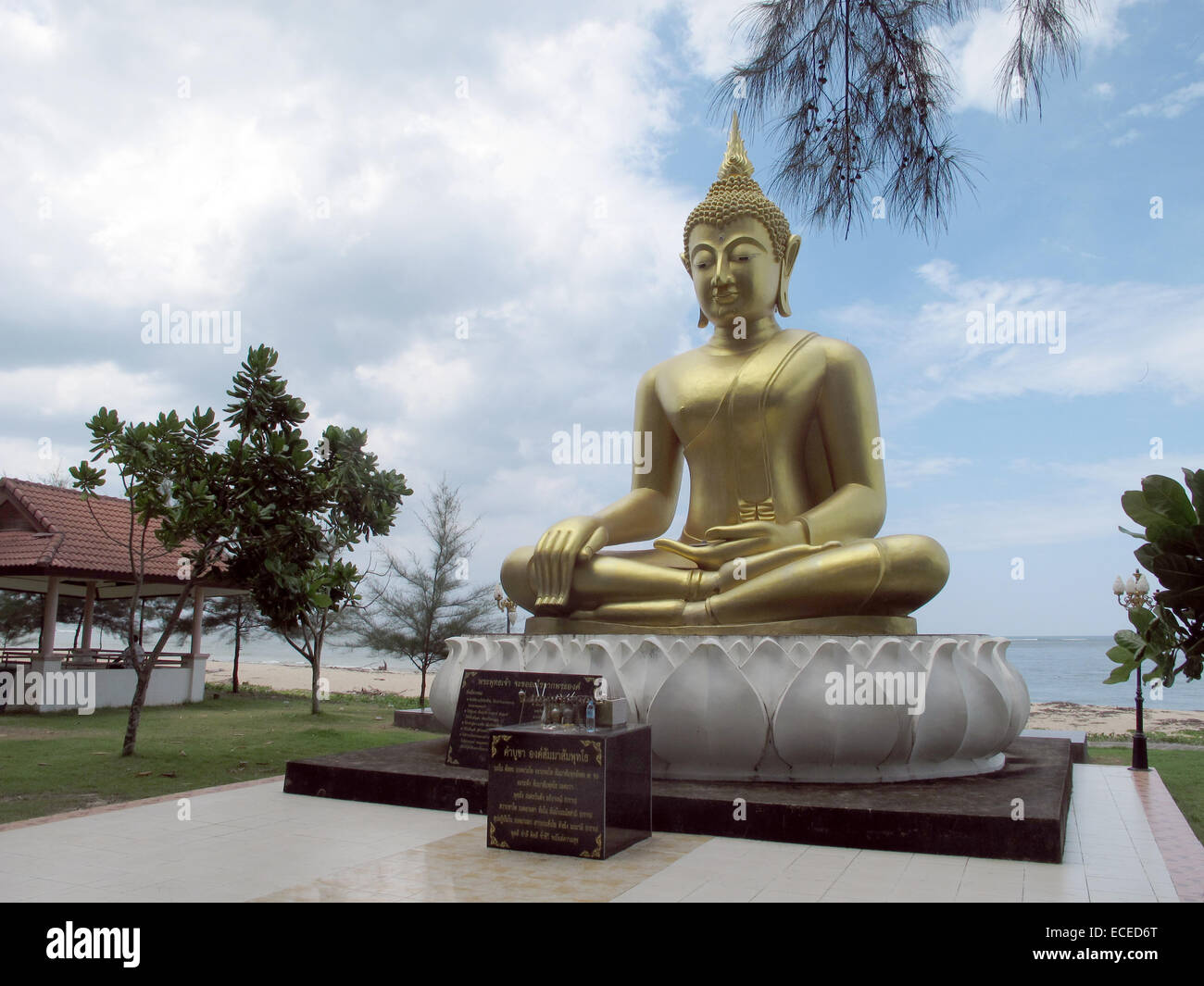A large Buddha watched over the tsunami monument in Ban Nam Khem, Thailand, 20 November 2014. Relatives have placed tiles there in memory of their loved ones. More than 8,000 people were killed in the region. Photo: CHRISTAINE OELRICH/dpa Stock Photo