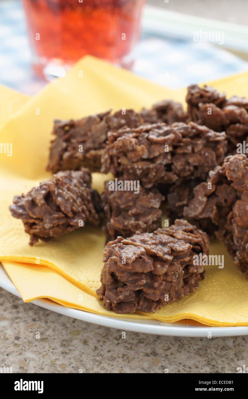 Chocolate corn flake cakes a simple party cake recipe for children to make Stock Photo