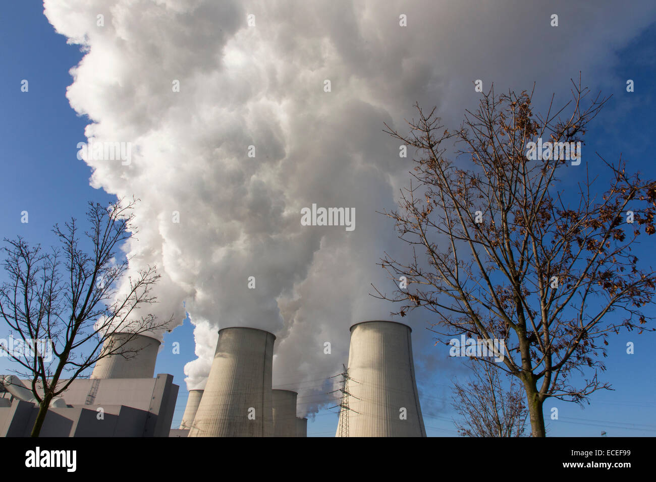 Steam rises from the cooling towers of the Vattenfall coal-fired power plant in Jaenschwalde, 09 December 2014 Stock Photo