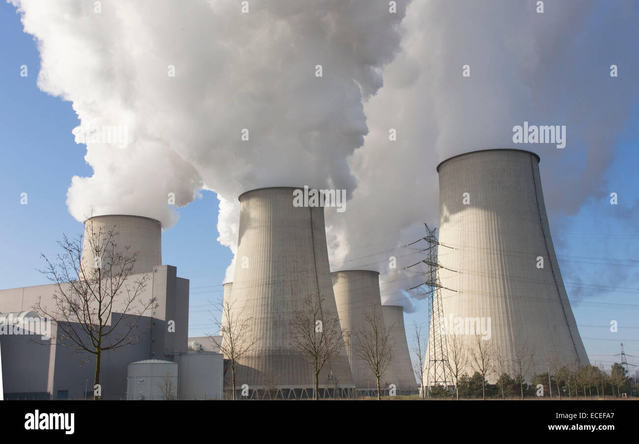 Steam rises from the cooling towers of the Vattenfall coal-fired power plant in Jaenschwalde, 09 December 2014 Stock Photo