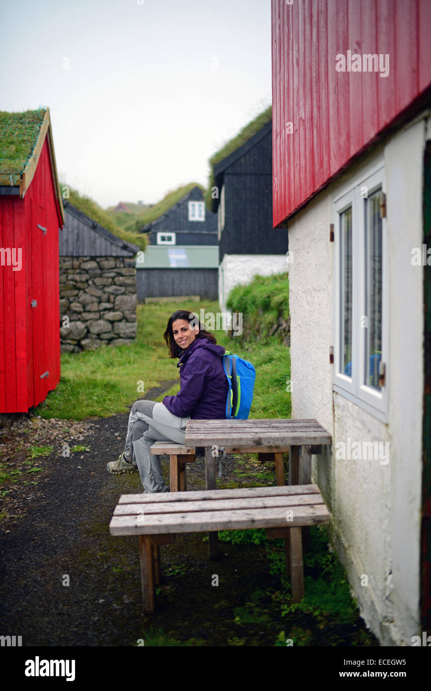 Attractive young woman in Mykines, Faroe Islands Stock Photo