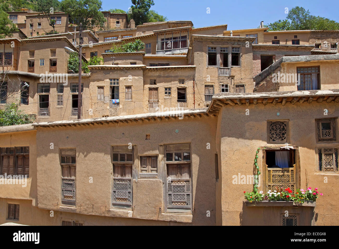 Interconnected houses made of adobe, rods and bole in terrace style in the village Masuleh / Massulya, Gilan Province, Iran Stock Photo