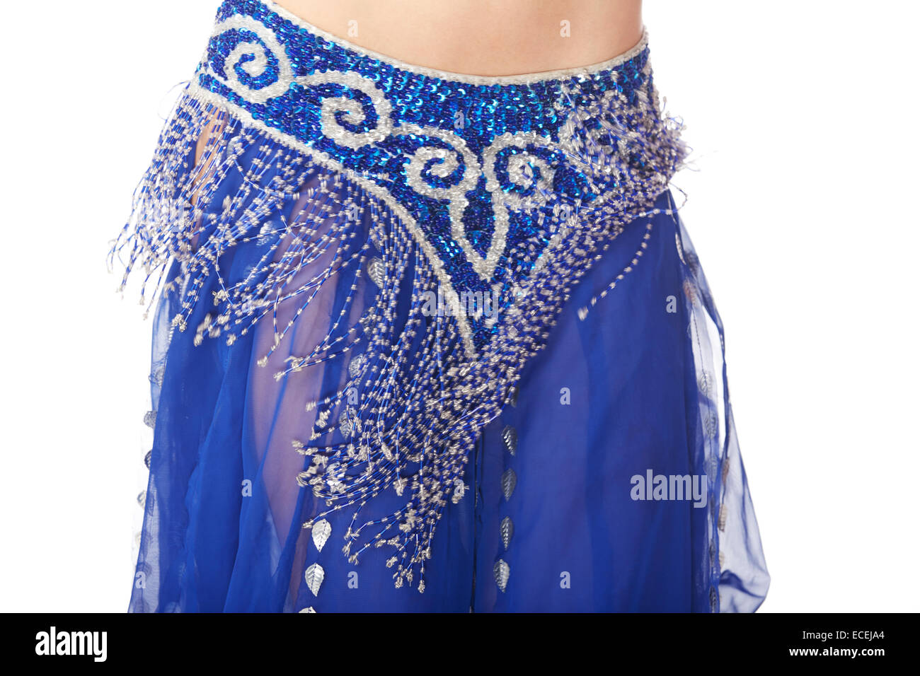 Belly dancer in blue traditional dress on a white background Stock