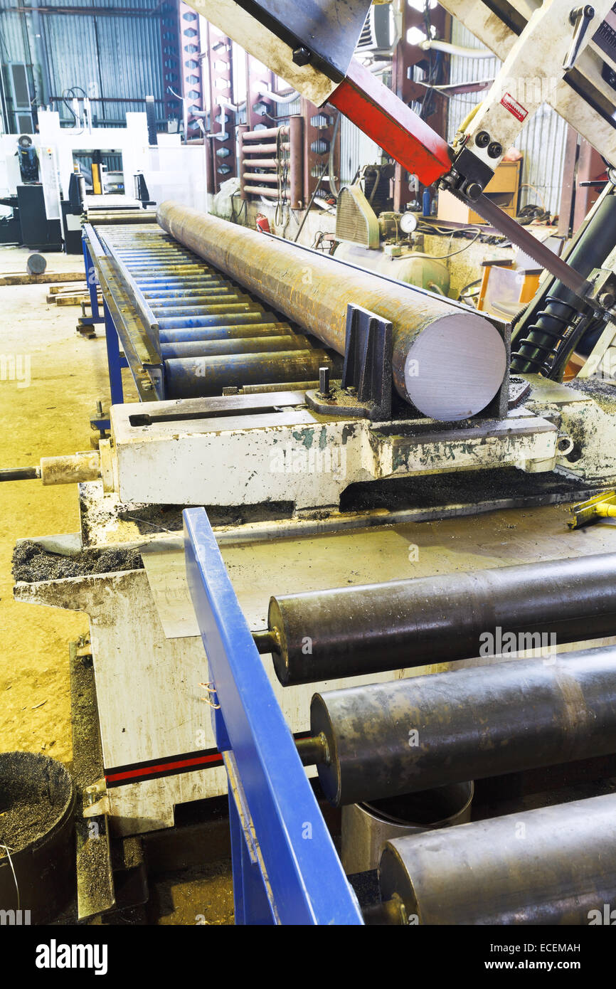 cutting saw machine with steel bar in mechanical Stock Photo