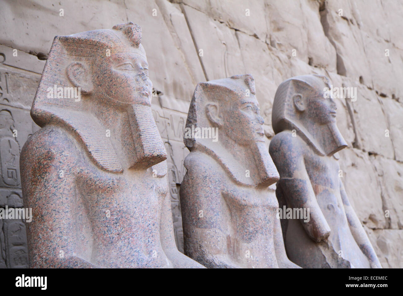 Three ancient stone granite statues in Egypt, Pharaohs Stock Photo Alamy