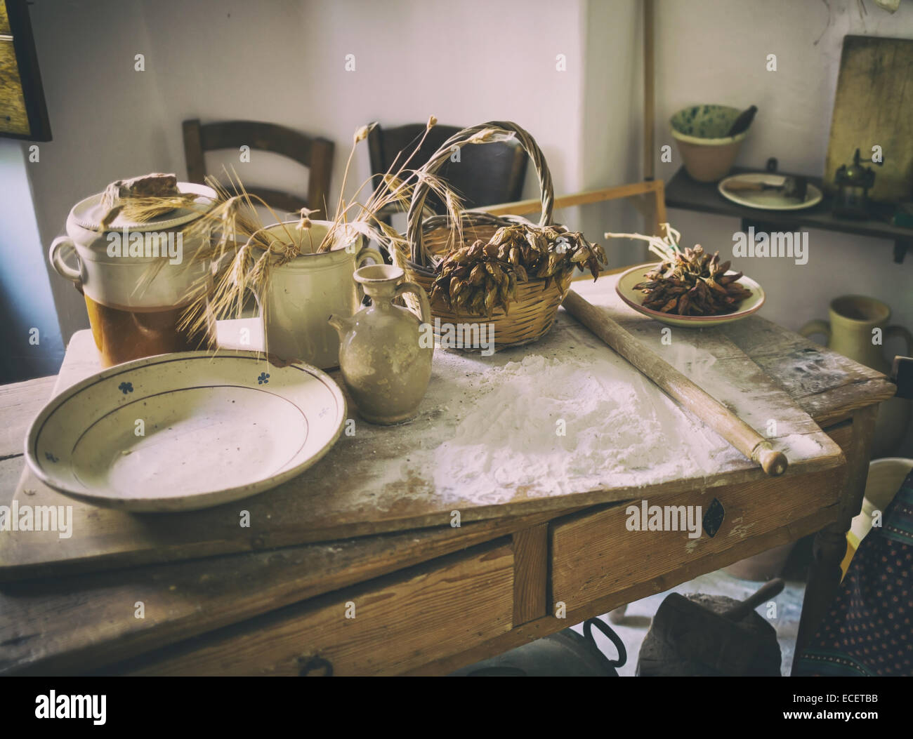 Table with ingredients and kitchen tools, vintage image. Stock Photo