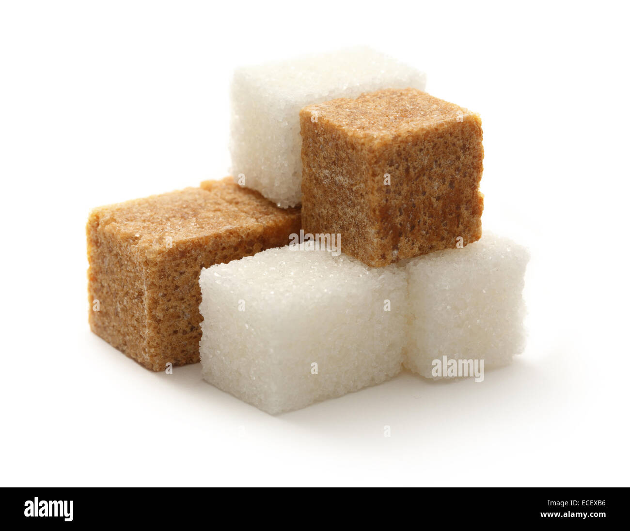 Cane and white sugar cubes Stock Photo