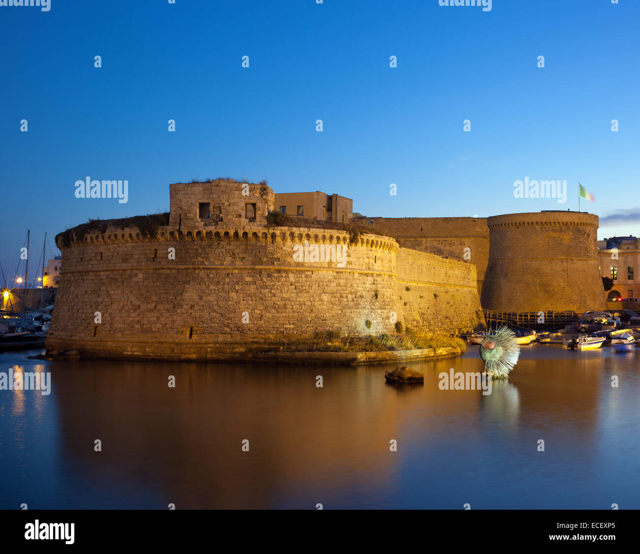 Angevin Castle of Gallipoli by night in Salento, Italy Stock Photo