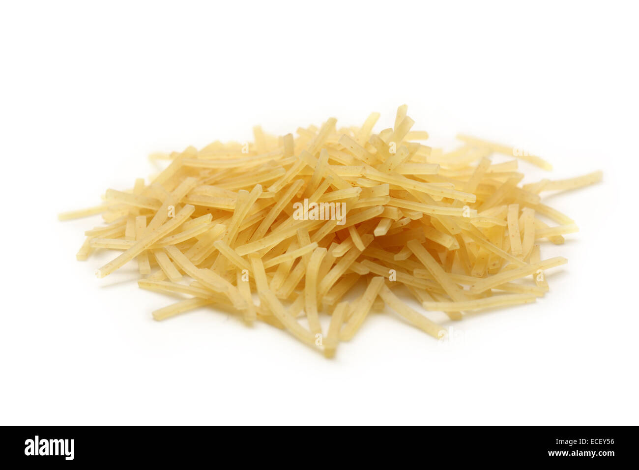 Short thin pasta tubes on white Stock Photo