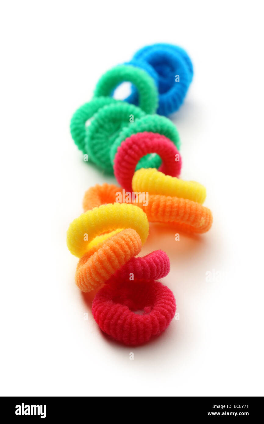 Colorful elastic hair bands on white background Stock Photo