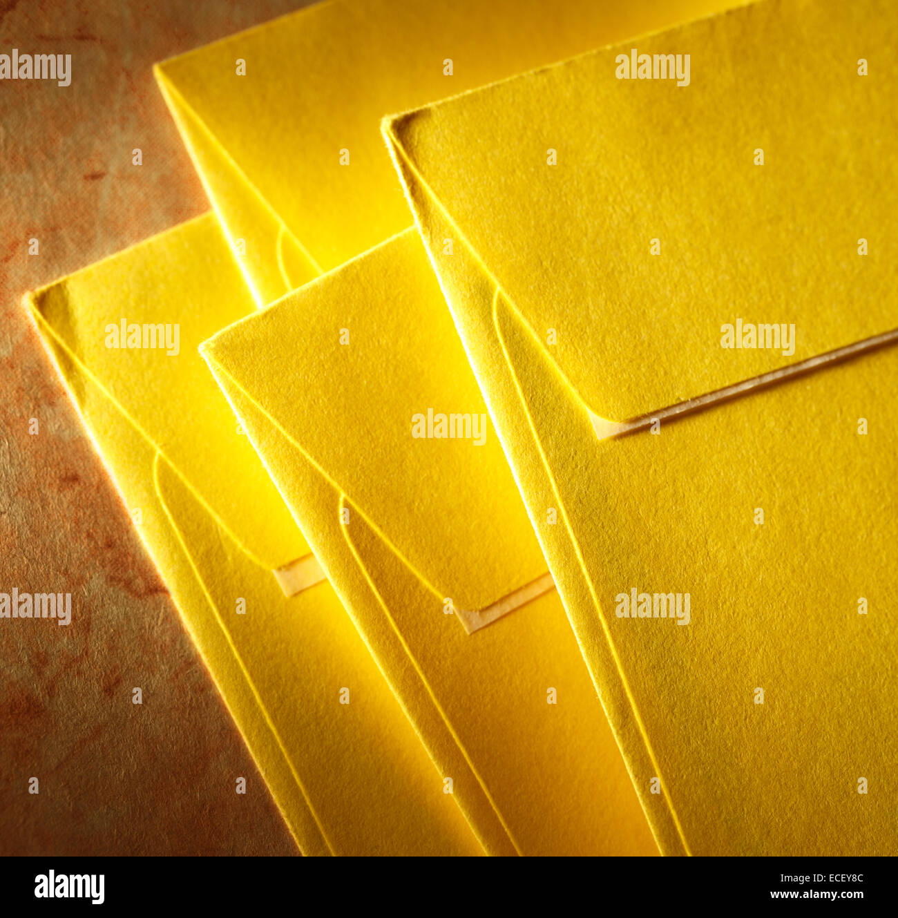 Blank yellow envelopes on paper Stock Photo Alamy