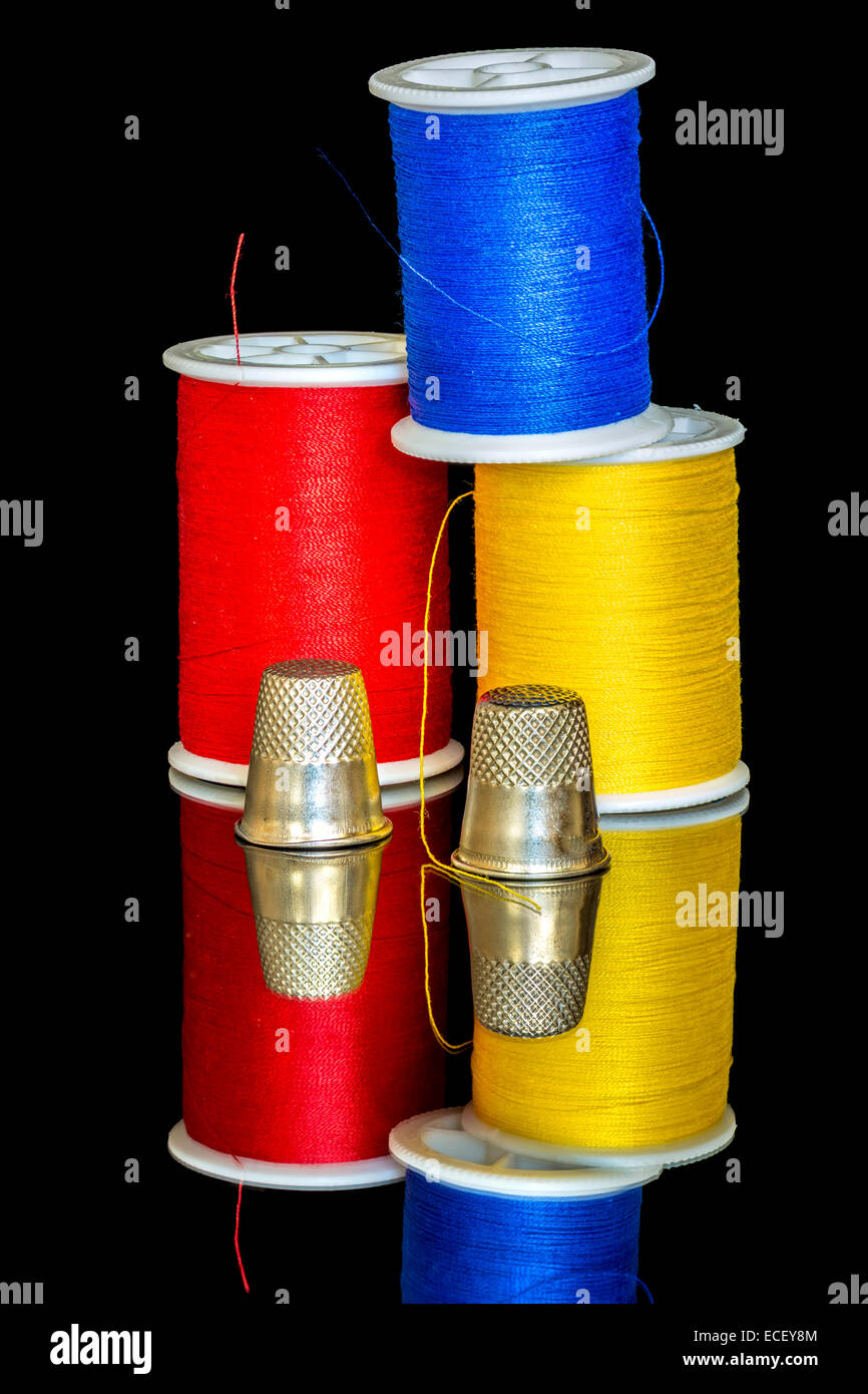 Thread and Thimble ready for sewing Stock Photo Alamy