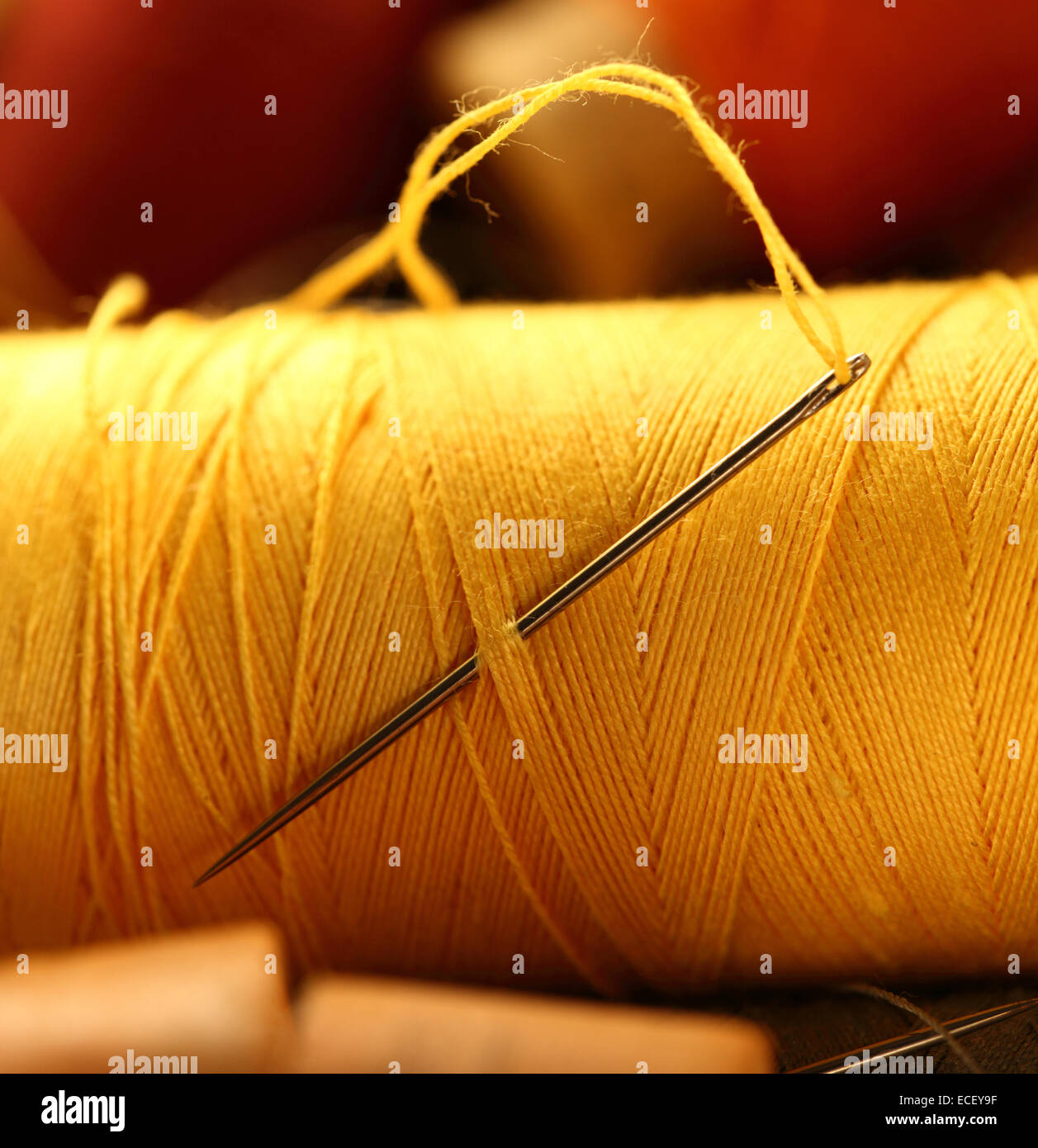 Thread bobbins with needle Stock Photo