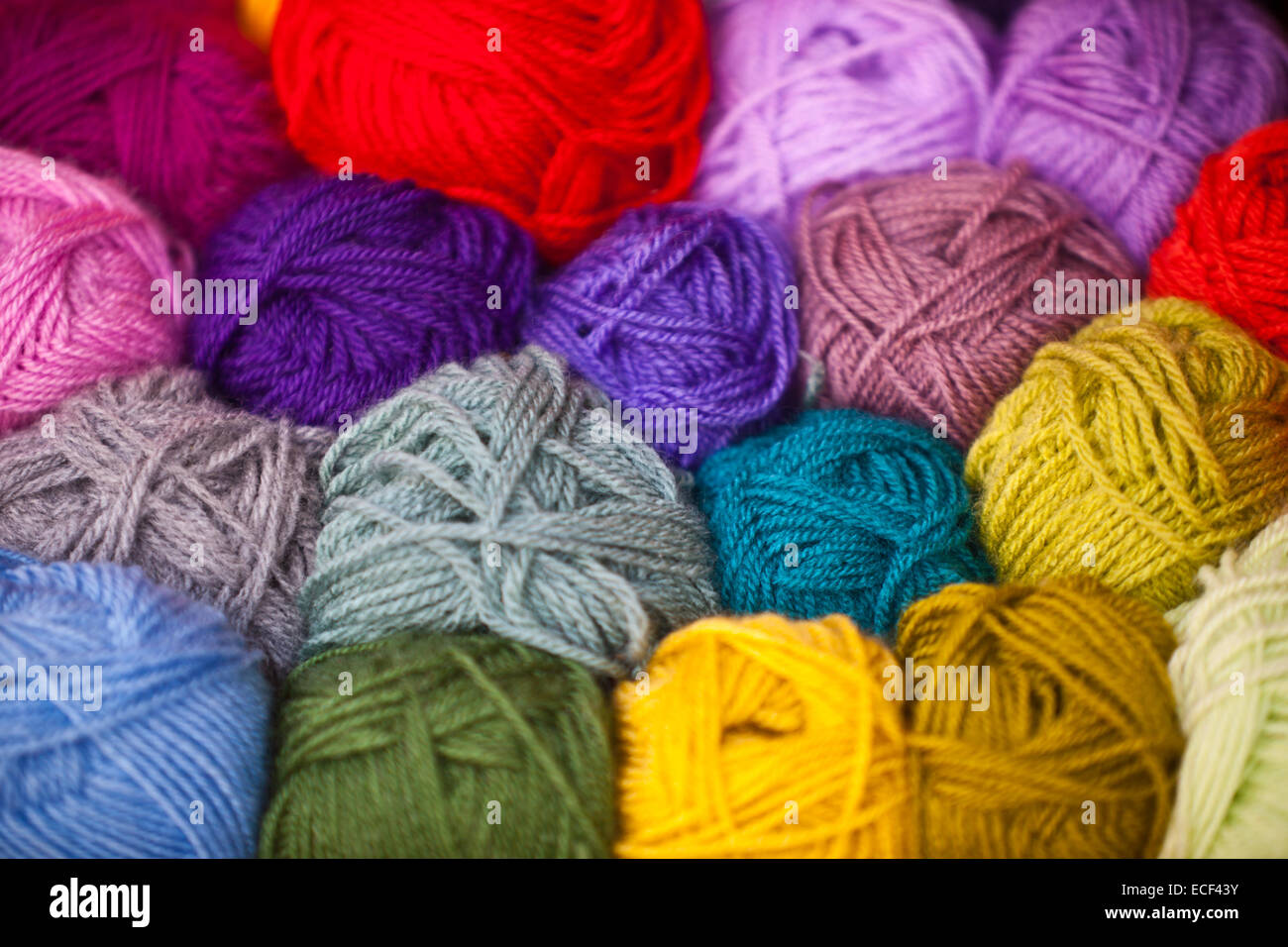 Colorful different wool thread balls. Shot with shallow depth of field Stock Photo