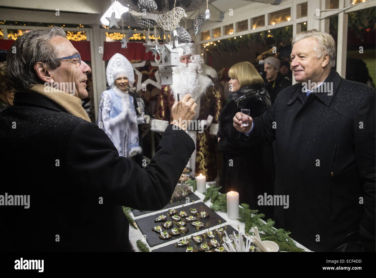 Moscow, Russia. 12th Dec, 2014. President of the Strasbourg-Ortenau Eurodistrict, Roland Ries and honorary president of the Russian Olympic Committee, Leonid Tyagachev (R) at the opening ceremony for “A Journey to Christmas” Christmas festival in Moscow. © Ilya Pitalev/TASS/Alamy Live News Stock Photo