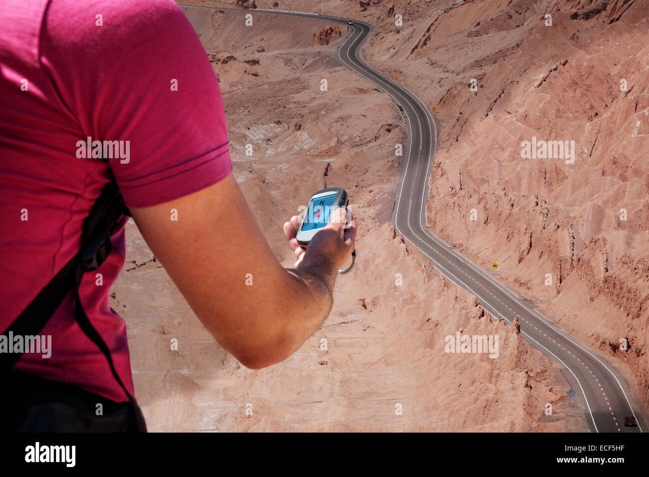 Person navigates with a gps in the hand Stock Photo