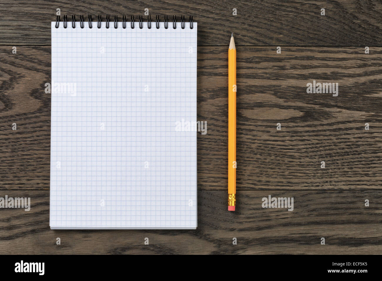 open notebook for writing or drawing on oak table, copy space for ...