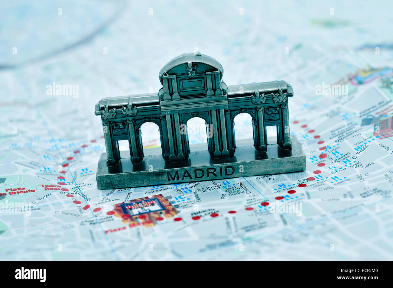 a miniature of the Puerta de Alcala on a map of Madrid, Spain Stock Photo