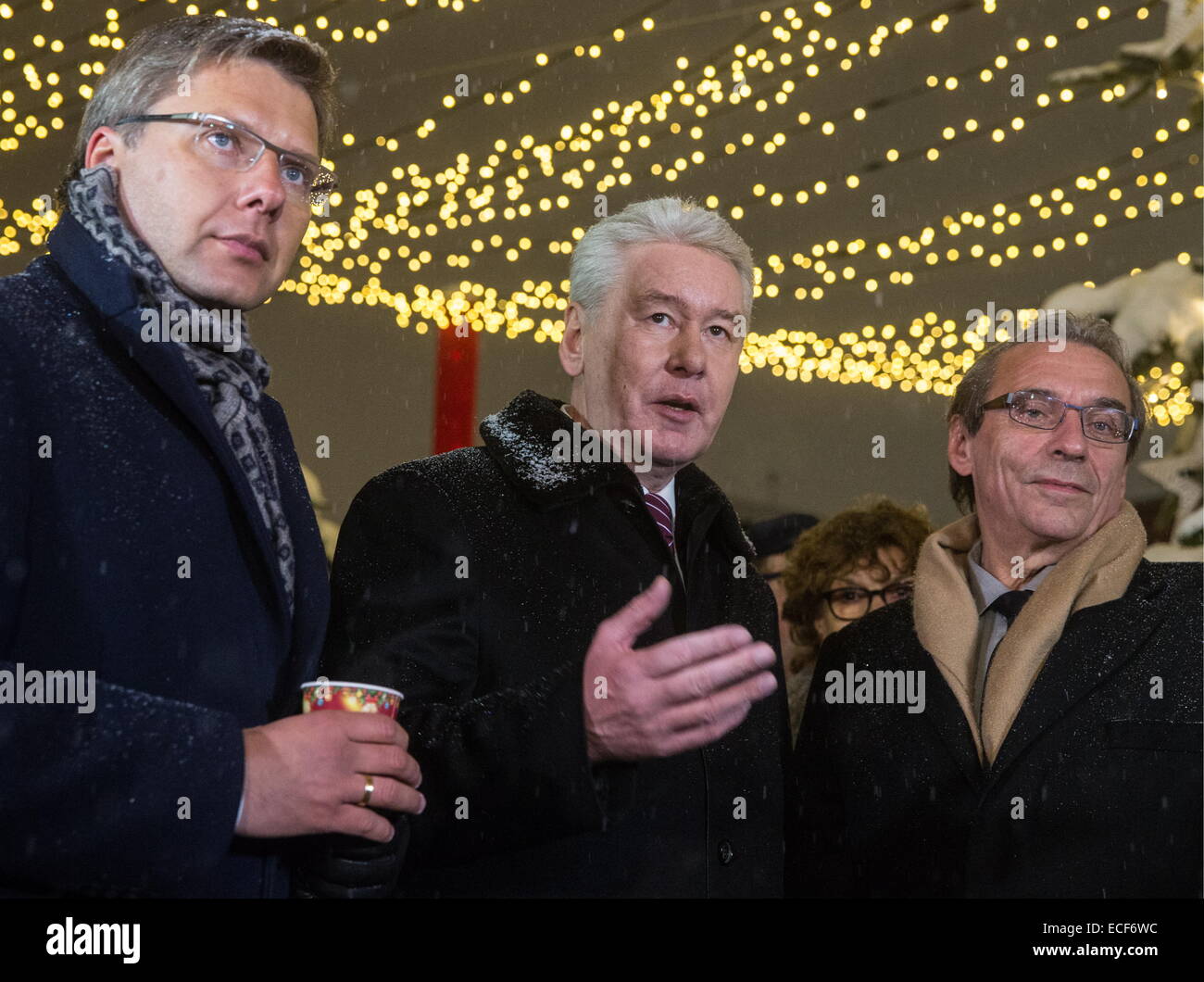 Moscow, Russia. 12th Dec, 2014. Riga mayor Nils Usakovs and Moscow mayor Sergei Sobyanin and President of the Strasbourg-Ortenau Eurodistrict, Roland Ries (L to R) at the opening ceremony for “A Journey to Christmas” winter festival in Moscow. © Ilya Pitalev/TASS/Alamy Live News Stock Photo