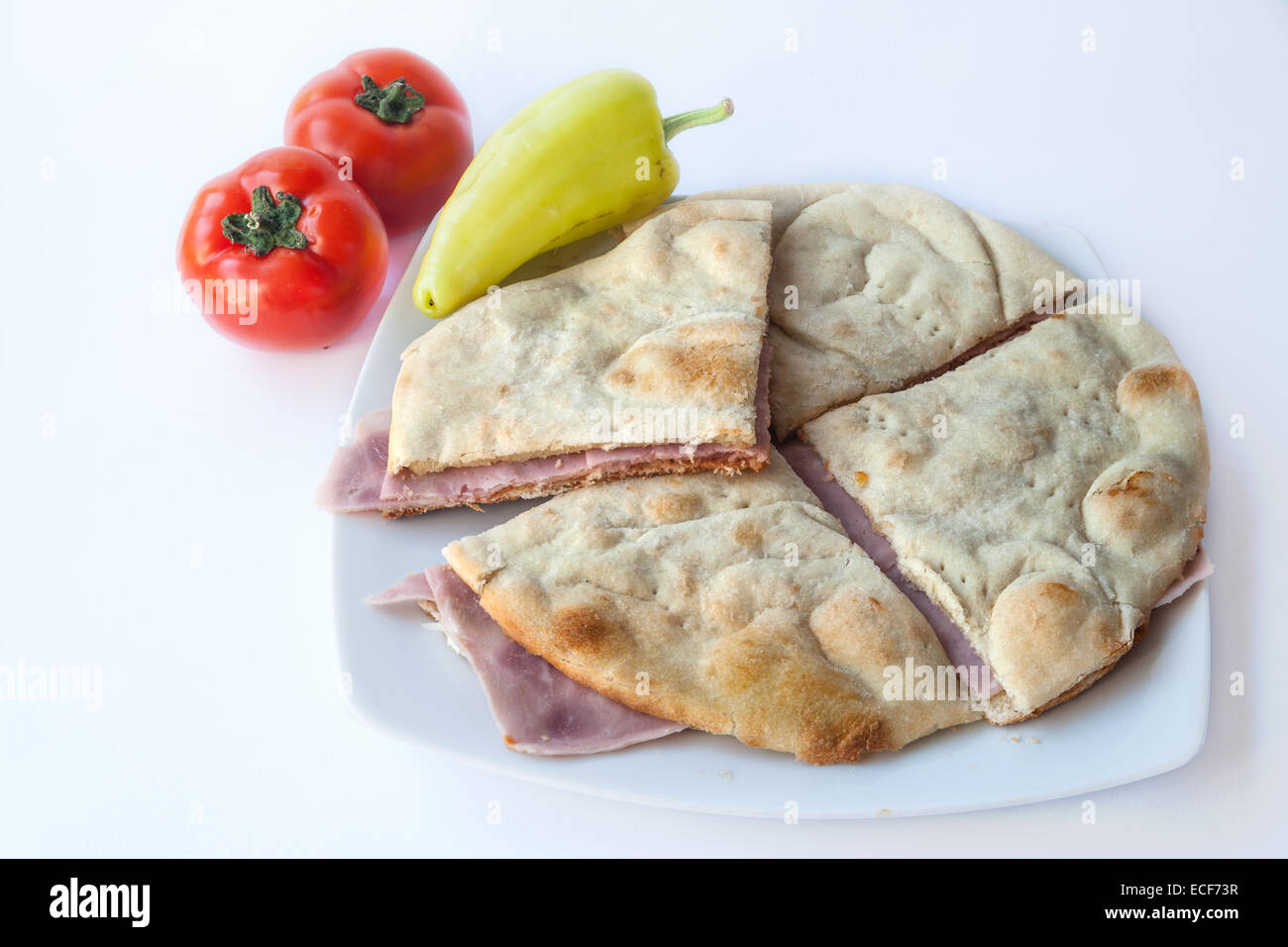 Grilled panini sandwiches stuffed with portobello mushroom, basil