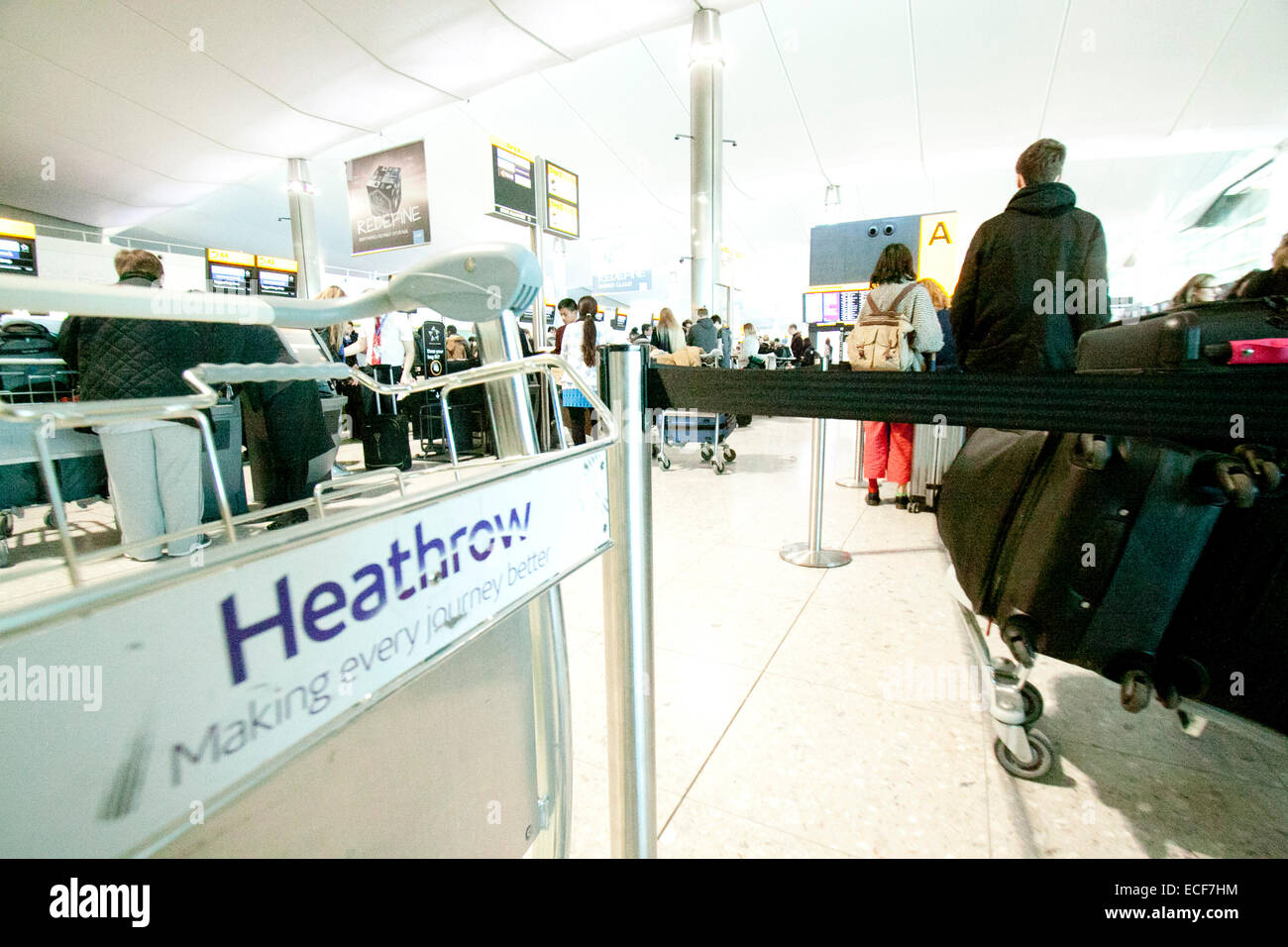 Heathrow London, UK. 13th December 2014. Passengers face delays and ...