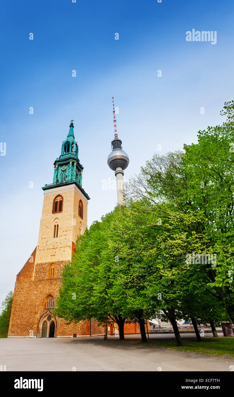 St. Mary's Church and Berliner Fernsehturm summer view in Berlin, Germany Stock Photo