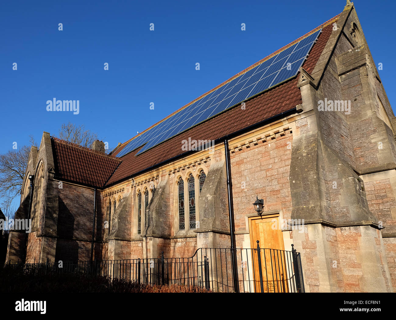 Solar panels on the roof of Cheddar Methodist Church, showing a green environmental awareness.  13th December 2014 Stock Photo