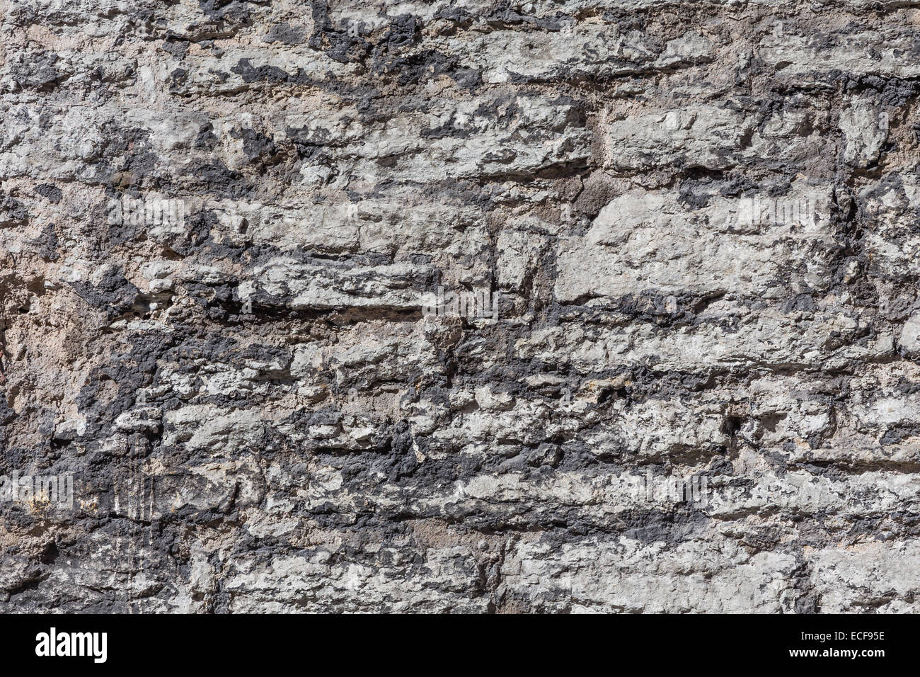 Photo of an old gray stone wall, background Stock Photo - Alamy